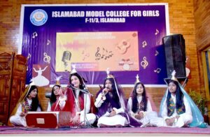 Students are performing in a singing competition at IMCG F-11/3