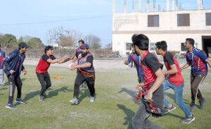 Students participating in a rugby game during the Annual Sports Festival 2024 of STAK group of Colleges