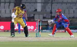 Peshawar Zalmi’s batter Saim Ayub is clean bowled out during the Pakistan Super League (PSL) Twenty20 cricket match plays between Karachi Kings and Peshawar Zalmi at the National Stadium