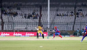 Peshawar Zalmi’s batter Saim Ayub is clean bowled out during the Pakistan Super League (PSL) Twenty20 cricket match plays between Karachi Kings and Peshawar Zalmi at the National Stadium