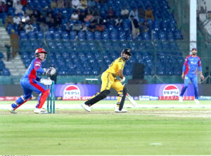 Peshawar Zalmi’s batter Saim Ayub is clean bowled out during the Pakistan Super League (PSL) Twenty20 cricket match plays between Karachi Kings and Peshawar Zalmi at the National Stadium