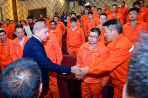 Prime Minister Muhammad Shehbaz Sharif interacts with engineers of the China Gezhouba Group Company (CGGC) working at the Daasu Hydropower project.