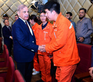 Prime Minister Muhammad Shehbaz Sharif interacts with engineers of the China Gezhouba Group Company (CGGC) working at the Daasu Hydropower project.