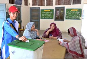 Principal Government Comprehensive Girls High School Robina Kausar announcing results during Student Council Election at Government Comprehensive Girls High School.