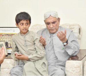 President Asif Ali Zardari offering Fateha during his visit to the family home of Shaheed Major Babar Khan