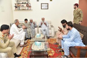 President Asif Ali Zardari offering Fateha during his visit to the family home of Shaheed Major Babar Khan