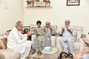 President Asif Ali Zardari offering Fateha during his visit to the family home of Shaheed Major Babar Khan