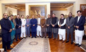 President Asif Ali Zardari in a group photo with a delegation of the members of the Azad Jammu and Kashmir Legislative Assembly belonging to Pakistan People's Party Parliamentarians, who called on him, at Aiwan-e-Sadr