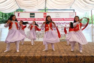 Female students presenting traditional Khattak dance during 19th Foundation Day of SBBWU.