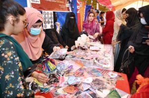 Female students presenting traditional Khattak dance during 19th Foundation Day of SBBWU.