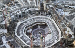 A beautiful view of the Khana Kaaba through rooftop of Clock Tower as a large number of pilgrims performing circumambulation (Twaaf).