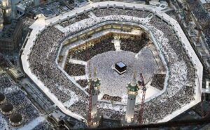 A beautiful view of the Khana Kaaba through rooftop of Clock Tower as a large number of pilgrims performing circumambulation (Twaaf).