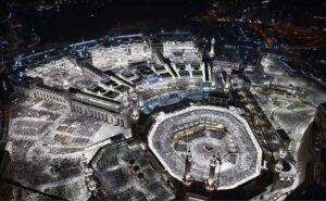 A beautiful view of the Khana Kaaba through rooftop of Clock Tower as a large number of pilgrims performing circumambulation (Twaaf).