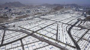 An aerial view of Mina Tent City where Hajj pilgrims stay in Mina over multiple nights in the month of Dhu al-Hijjah, giving Mina the nickname "City of Tents." With a capacity of up to 3 million people, Mina has been called the largest tent city in the world