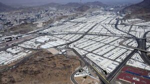 An aerial view of Mina Tent City where Hajj pilgrims stay in Mina over multiple nights in the month of Dhu al-Hijjah, giving Mina the nickname "City of Tents." With a capacity of up to 3 million people, Mina has been called the largest tent city in the world