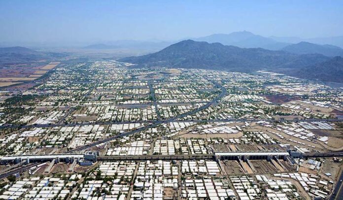 An aerial view of Mina Tent City where Hajj pilgrims stay in Mina over multiple nights in the month of Dhu al-Hijjah, giving Mina the nickname 