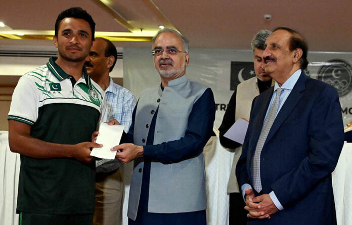 Federal Secretary IPC Nadeem Irshad Kayani addressing at prize distribution ceremony among players of AVC Challenger Cup-2024 CAVA U-18 Volleyball Championship-2024