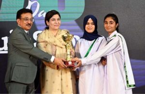 Executive Director General of Information Service Academy (ISA) Muhammad Arshad Munir poses for a group photo during an event organized to mark the 78th Independence Day celebrations