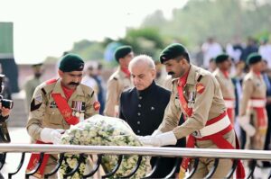 Prime Minister Muhammad Shehbaz Sharif laying a floral wreath at the Yadgar-e-Shuhada in the Pakistan Monument on the 78th Independence Day