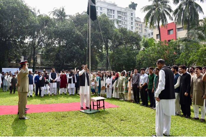 Pakistan High Commissioner to Bangladesh, Syed Ahmed Maroof is joined by Pakistani students in Bangladesh in hoisting the national flag to mark the 78th independence day of Pakistan on 14 august 2024 in Pakistan High Commission