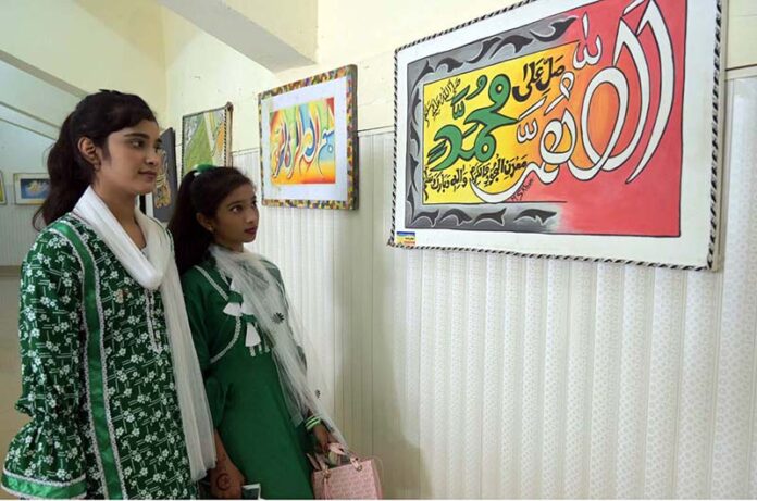 Young Girls are visiting calligraphic exhibition at Sargodha Arts ...