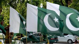 A vendor selling flags and children clothes to mark the 78th Independence Day celebrations