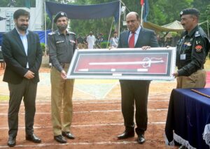 DG Walton Sufyan Sarfaraz Dogra and DIG North Abdur Rab Ch. presenting a honorary sword to ADG North FIA Dr. Munir Masood Marth at Walton Academy.