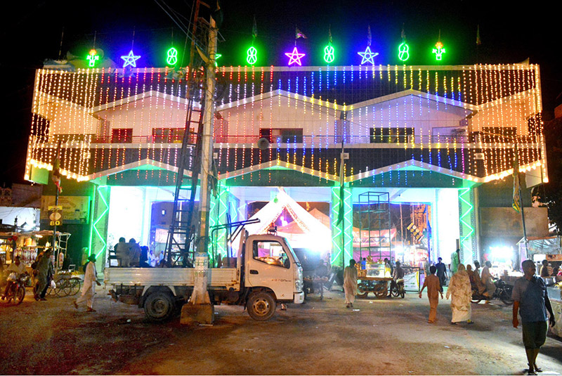 The RabiulAwal Gate beautifully illuminated with colorful lights for