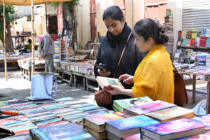 A vendor displays decorative items in preparation of Eid Milad-ul-Nabi (SAW) celebrations at Gumpat Road