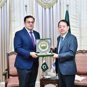 Federal Minister for Economic Affairs Ahad Cheema is presenting souvenir to Masatsugu Asakawa President of Asian Development Bank in Federal Capital