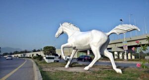 A newly installed horse model by CDA adds beauty to Rawal Dam Chowk in the Federal Capital