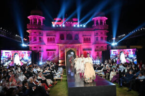 Model walks the ramp during the fashion presentation at the inauguration of the Pakistan Institute of Fashion and Design (PIFD) at Mohatta Palace, Museum Karach.