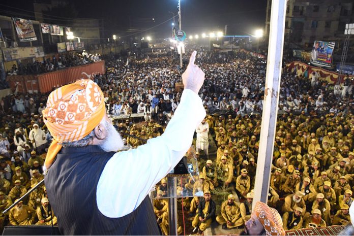 Chairman Jamiat Ulem-e-Islam Maulana Fazalur Rehman addressing to Shuhda-e-Islam Conference on the occasion of Yom-e-Shahadat of Ex-Senator Dr. Khalid Mehmood Soomro at Municipal Stadium