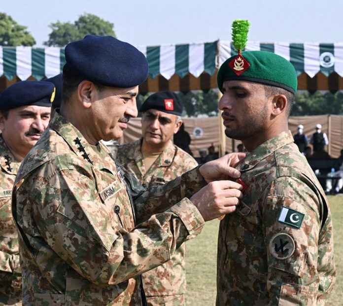 General Syed Asim Munir, NI (M), Chief of Army Staff (COAS) confers the highest military shooting honor, ‘The Master at Arms’ Trophy to Sepoy Aftab Ahmed of Punjab Regiment at the Closing Ceremony of 44th Pakistan Army Rifle Association (PARA) Central Meet at the Army Marksmanship Unit