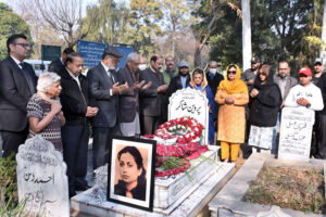 Chairperson, Parveen Shakir Trust, Parveen Qadir Agha, members of the trust, poets and writers offering Fateha at the grave of Parveen Shakir in H-8 graveyard to observe her 30th Death Anniversary.