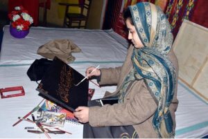 An art student participate to show her creativity in an arts and painting competition organized by the Knowledge of Art Academy at Ravi Road