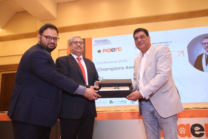 Judge of the Supreme Court, Justice Athar Minallah and Founder of the international conference on animals & environmental rights Mr Altamush Saeed presenting Champion of the Animals rights award to Director of the Four Paws International Dr Amir Khalil.