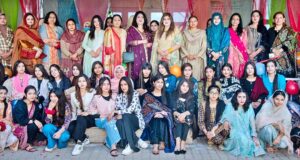 A group photo of Principal Dr. Fariha Nighat and Mrs. Sadia Naseem Arif along with students on the occasion of Jashan-e-Baharan at Government College Dhok Elahi Bakhsh.