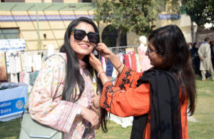 Woman visiting stalls during the 3rd edition of "Hamari Dastan" organized by the Women Chamber of Commerce and Industries at the Ladies Club.