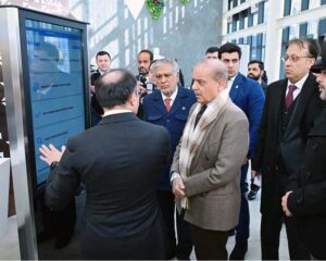 Prime Minister Muhammad Shehbaz Sharif being briefed by Mr. Ulvi Mehdiyev, Chairman of the State Agency for Public Service and Social Innovation about the services offered by by "ASAN KHIDMAT" during his visit to one of the centers in Baku.