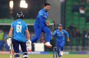 Afghanistan bowler Azmatullah celebrates the wicket of “Phil Salt” during the ICC Champions Trophy one-day international (ODI) cricket match between Afghanistan and England at the Gaddafi Stadium.