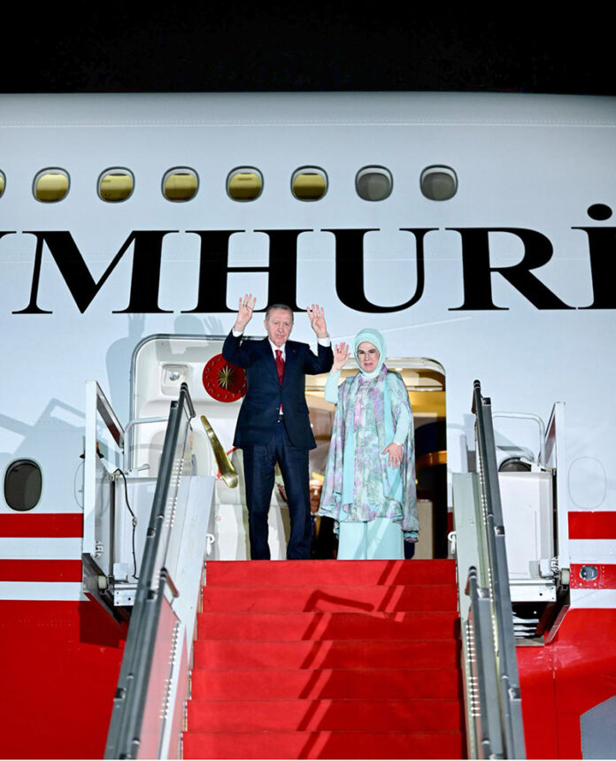 President of Turkiye, Recep Tayyip Erdogan waves back to Prime Minister Shehbaz Sharif, who saw him off at Noor Khan Air Base