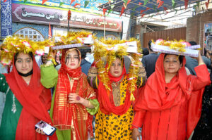 A large number of devotees attending the 773rd Urs celebration of Hazrat Lal Shahbaz Qalandar at his shrine.