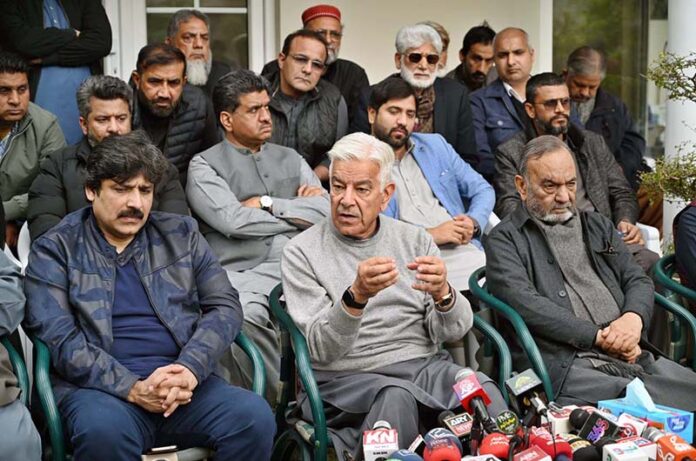 Defense Minister Khawaja Muhammad Asif addressing media persons at his residence