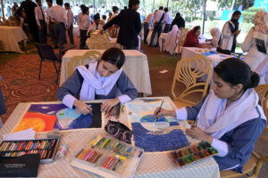 Students busy on drawing competition during Art & Spring festival at public school.