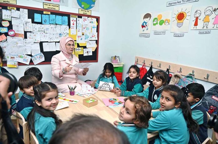 The First Lady of Turkiye, Mrs. Emine Erdogan, interacted with students in a classroom during her visit to the Maarif School in Sector H-8