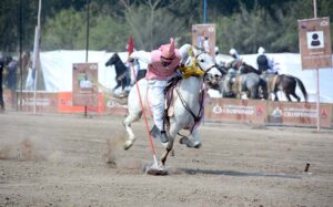 Horse riders showcase their skills in a tent-pegging competition held as part of the 10th Lyallpur Arts & Literature Festival at the University of Agriculture Faisalabad (UAF).