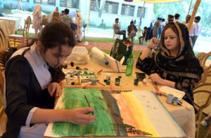 Students busy on drawing competition during Art & Spring festival at public school.