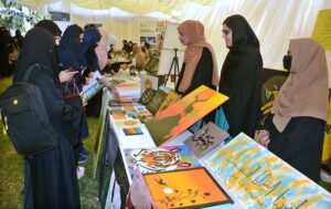 Student is giving final touches to her painting during All Pakistan Business Startup Expo of 10th Lyallpur Arts & Literature Festival at University of Agriculture Faisalabad (UAF).