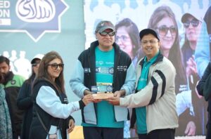 Federal Minister for Finance and Revenue, Senator Muhammad Aurangzeb, distributes prizes and medals among winners at the Faysal Bank SOP Unified Marathon 2025. The event celebrated inclusivity and sportsmanship, bringing together athletes from diverse backgrounds.